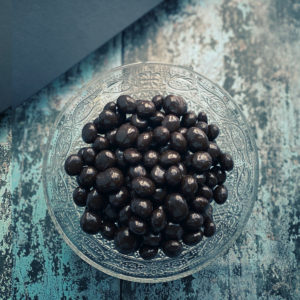 Dark chocolate covered roasted coffee beans
